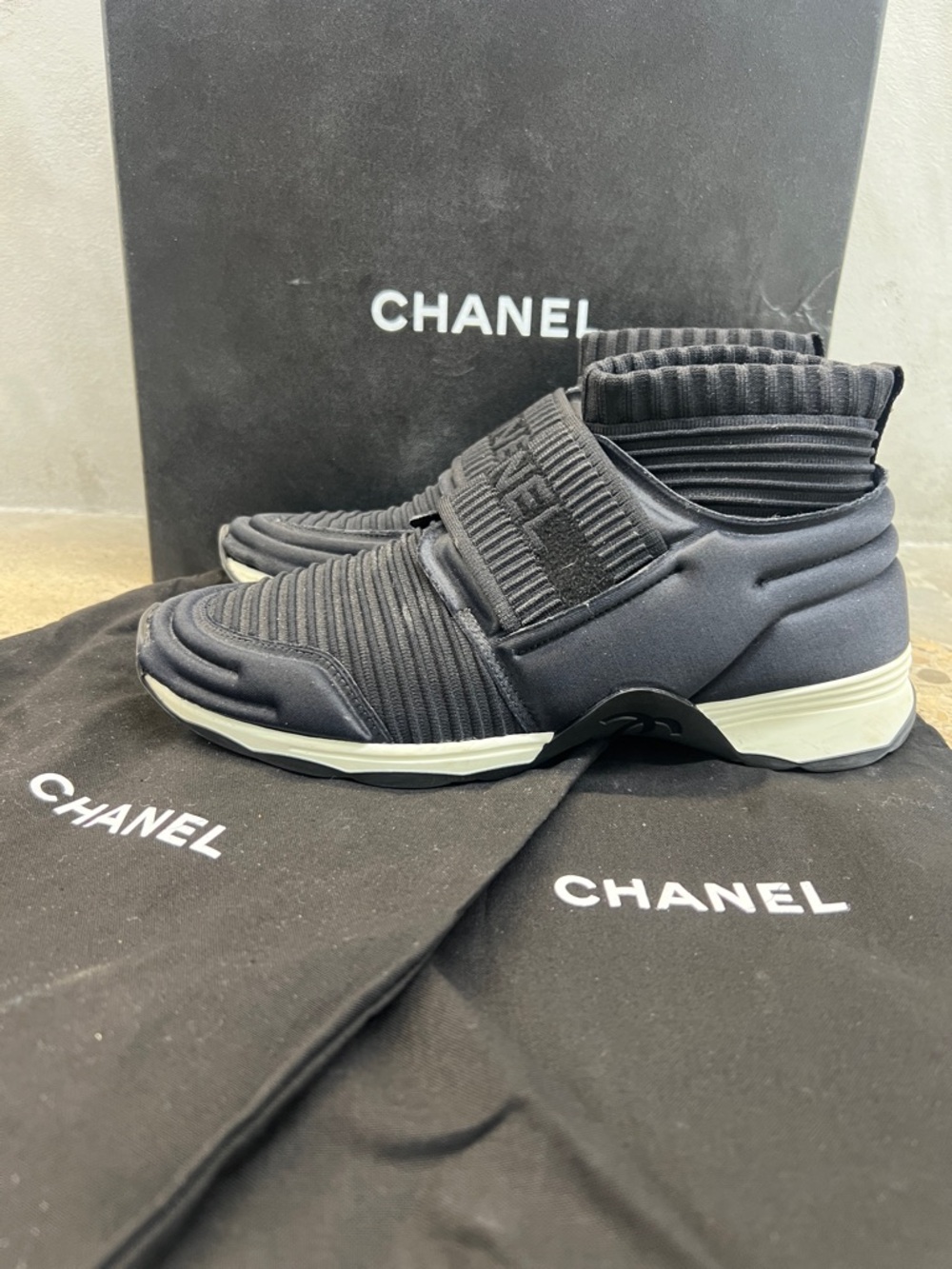 CHANEL Black High-Top Slip-On Knit Sneakers with White Sole
